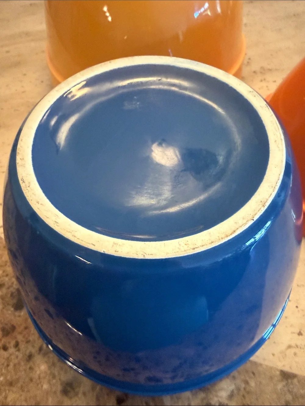 Crate&Barrel Stackable Ceramic Mixing Bowls in Yellow, Blue, and Orange
